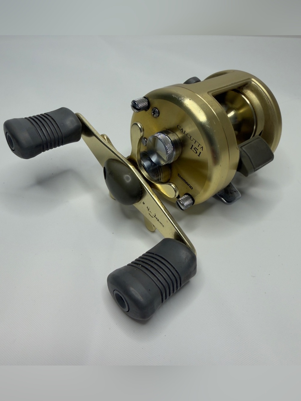 Shimano Calcutta 151 Gold Baitcasting Fishing Reel made in Japan. Left Hand Reel